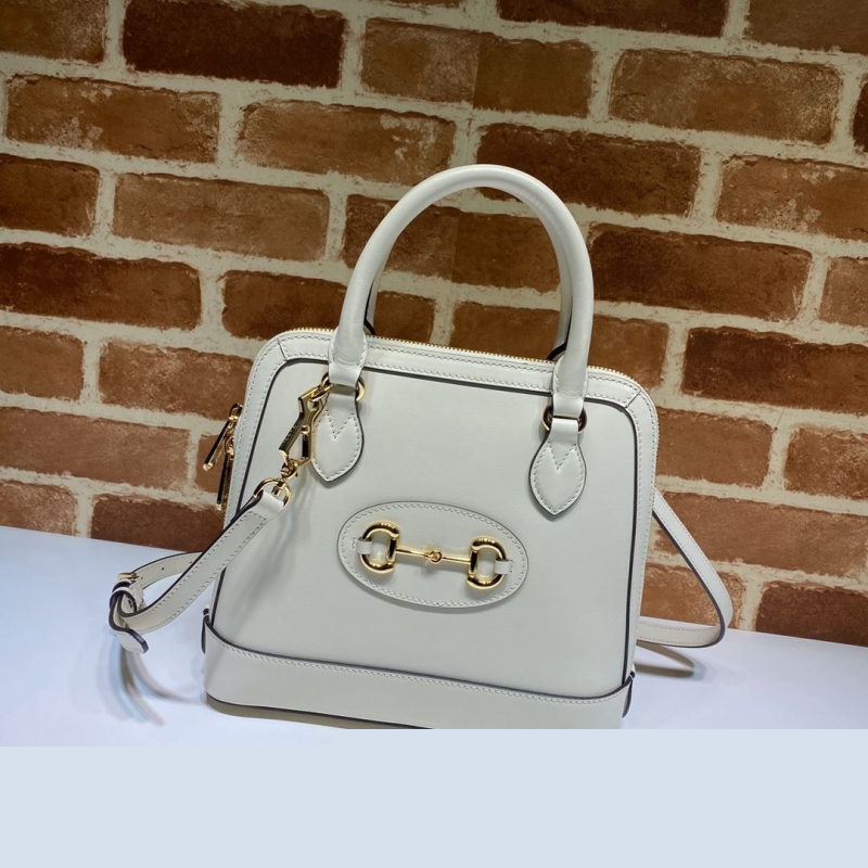 G*u*i top handle bags